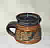 photo of pottery baby mug