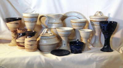 photo of all of our wheel-thrown travel communion sets