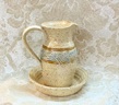 photo of stoneware communion cruet made by Debra Ocepek of Ocepek Pottery